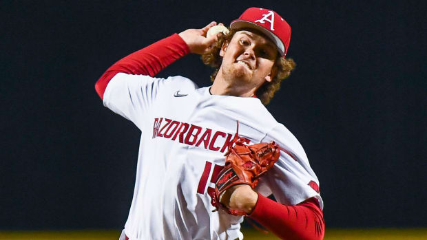 Razorbacks' Ben McLaughlin on mound shutting down Omaha in win Tuesday night.